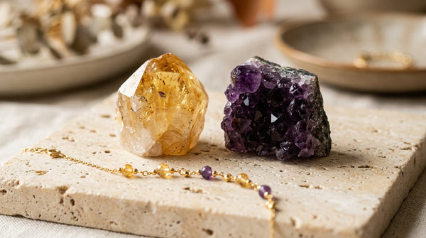 Golden citrine and purple amethyst crystals with a crystal jewelry bracelet